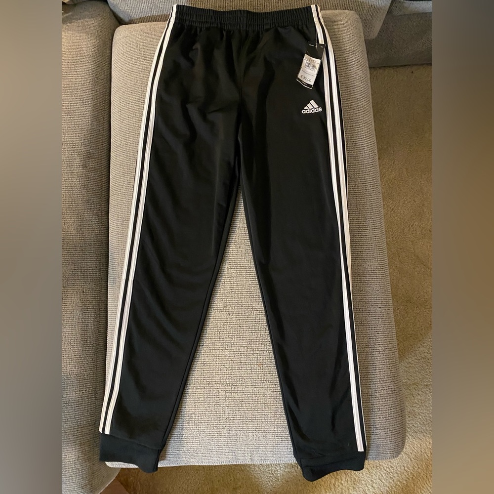Size L, (14/16) Adidas, black joggers with classic white stripes. NWT